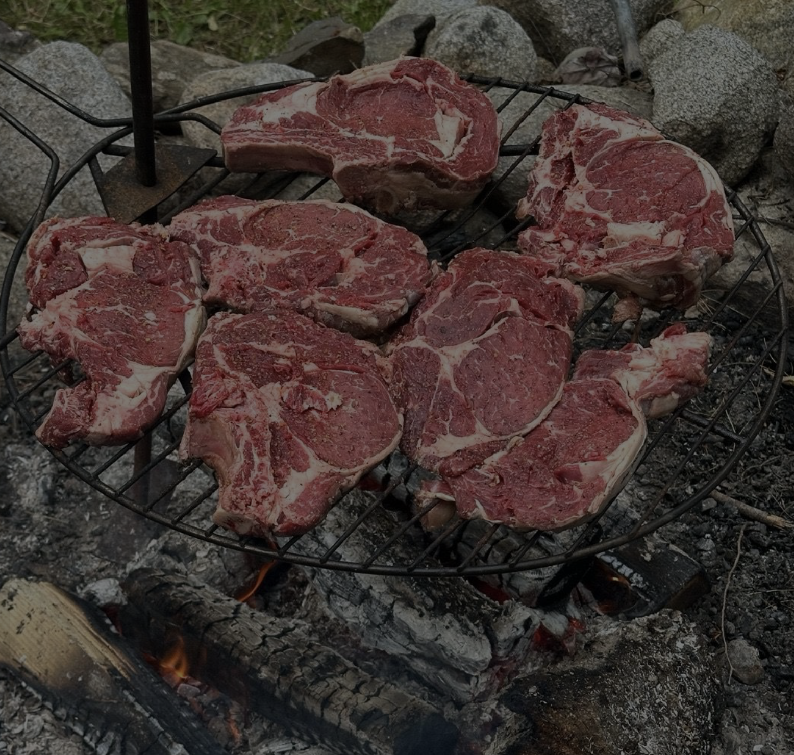 Tony's fire-cooked steaks over open flame